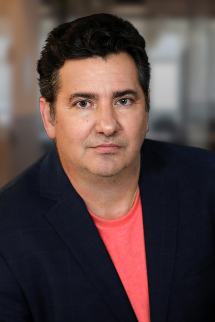 Headshot image of CEO, John Acunto